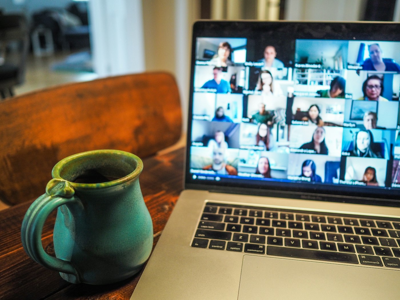 A laptop screen showing a video consultation call